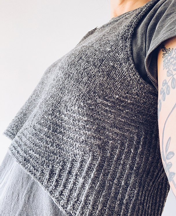 Byssa Tank Knitting Pattern designed by Victoria Pemberton. A textured twisted rib tank in grey, published by Brooklyn Tweed.